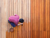Man painting wood